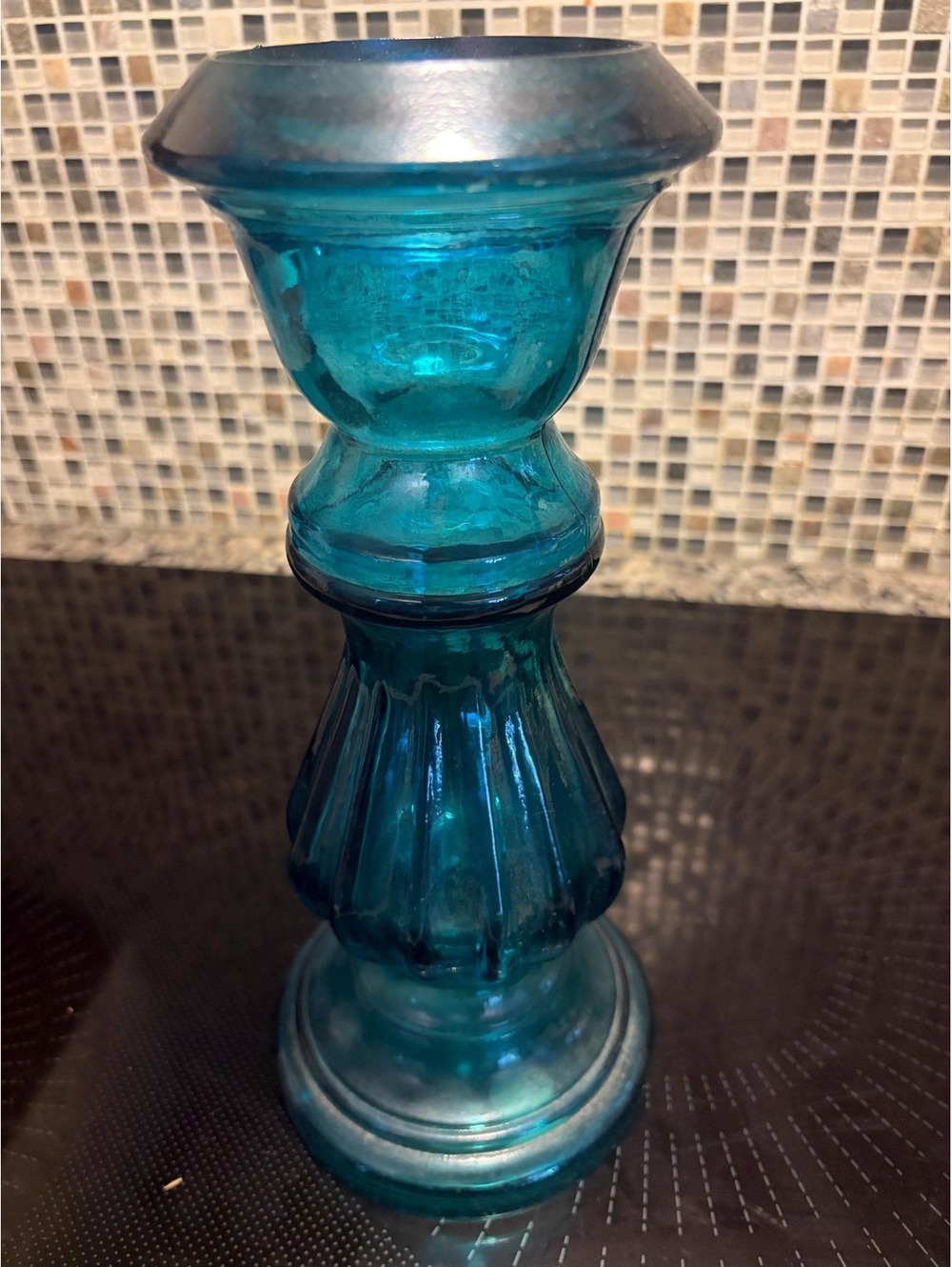 This is a recycled turquoise glass candle holder or vase by Vidrios San Miguel.